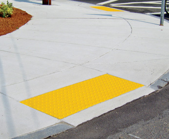 Yellow Cast in Place Replaceable Tactile on Concrete