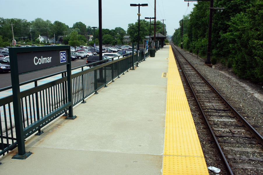 https://adatile.com/wp-content/uploads/2019/12/blind-floor-tiles-on-train-station-platform.jpg