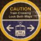 caution train crossing look both ways Sign