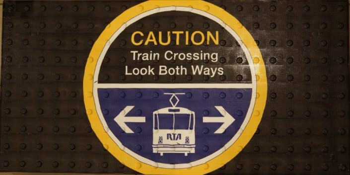 caution train crossing look both ways Sign
