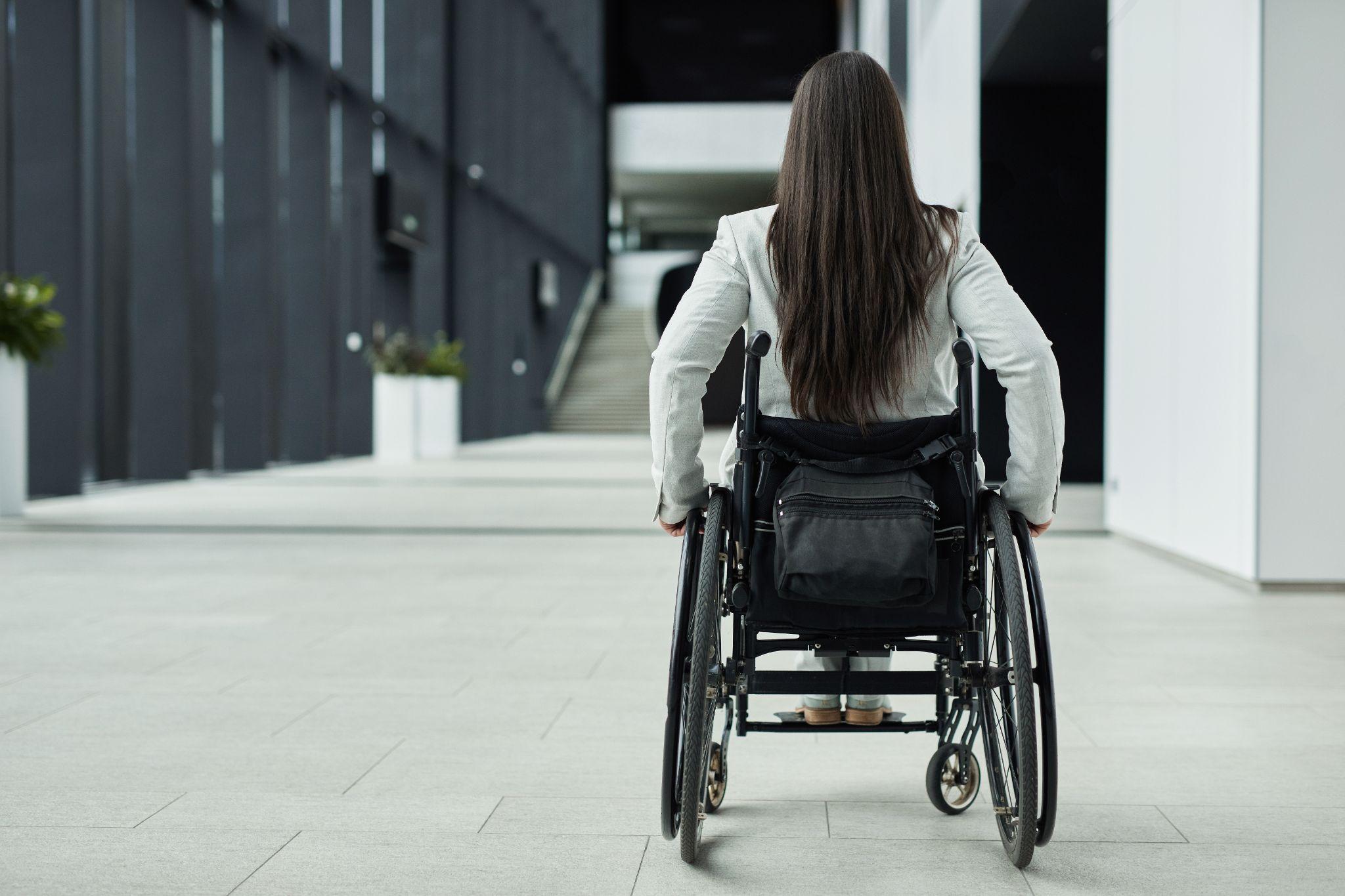 view of woman from behind in wheelchair
